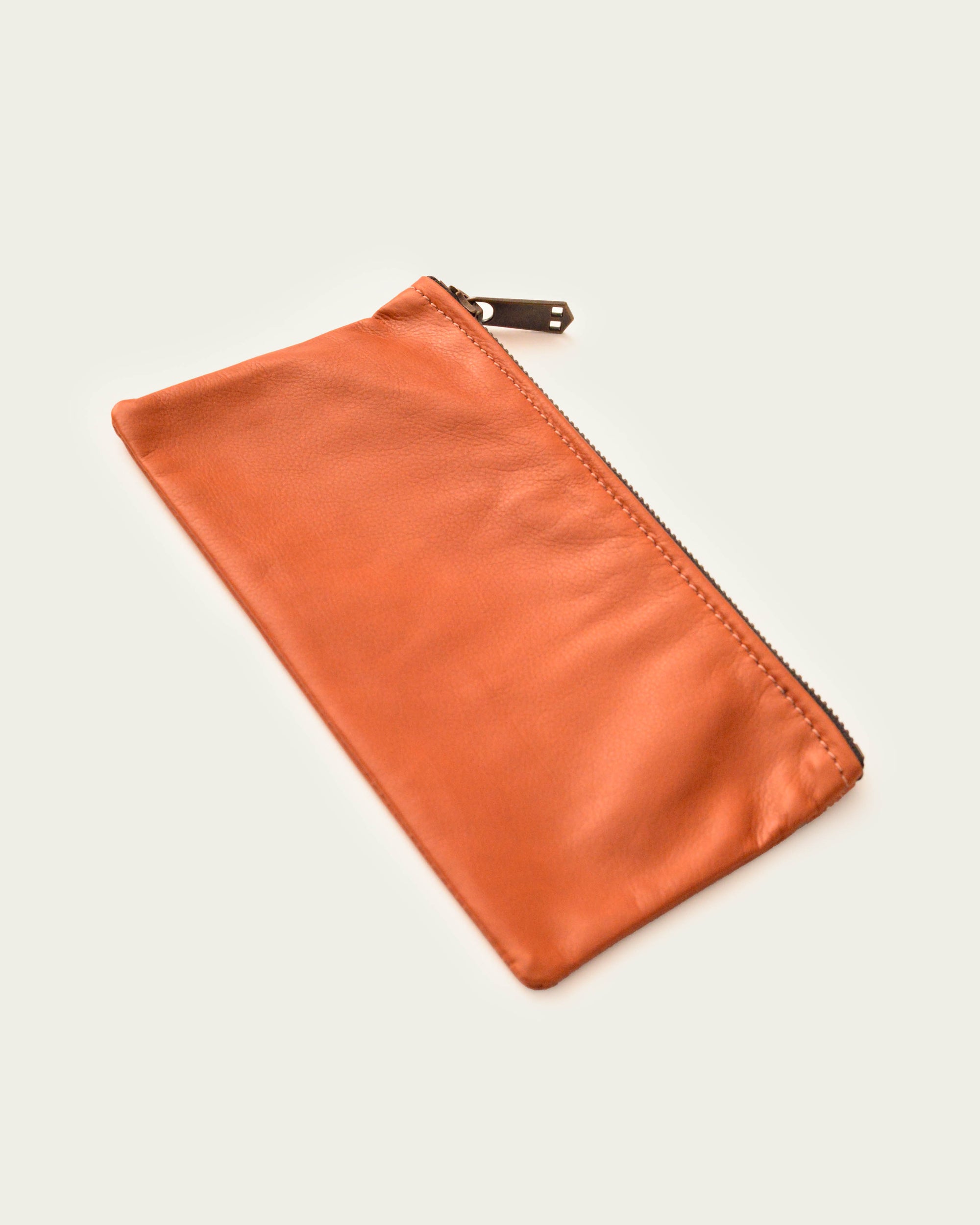 The 7” Pouch - Burnt Orange Lamb