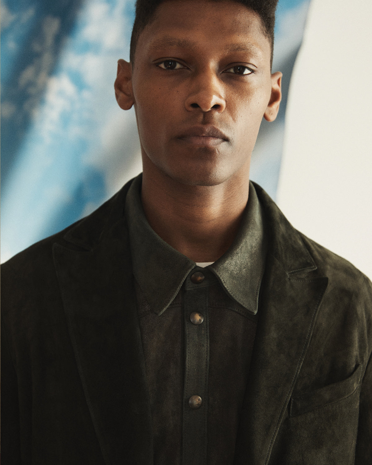 Close-up of a man wearing a Savas Suede blazer